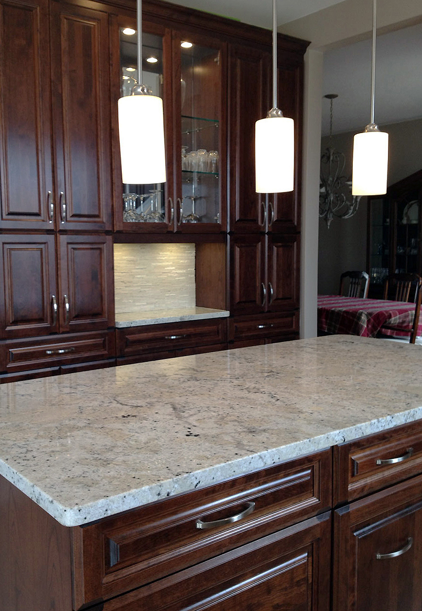 Our Updated Kitchen with a Granite Countertop Highlight.
